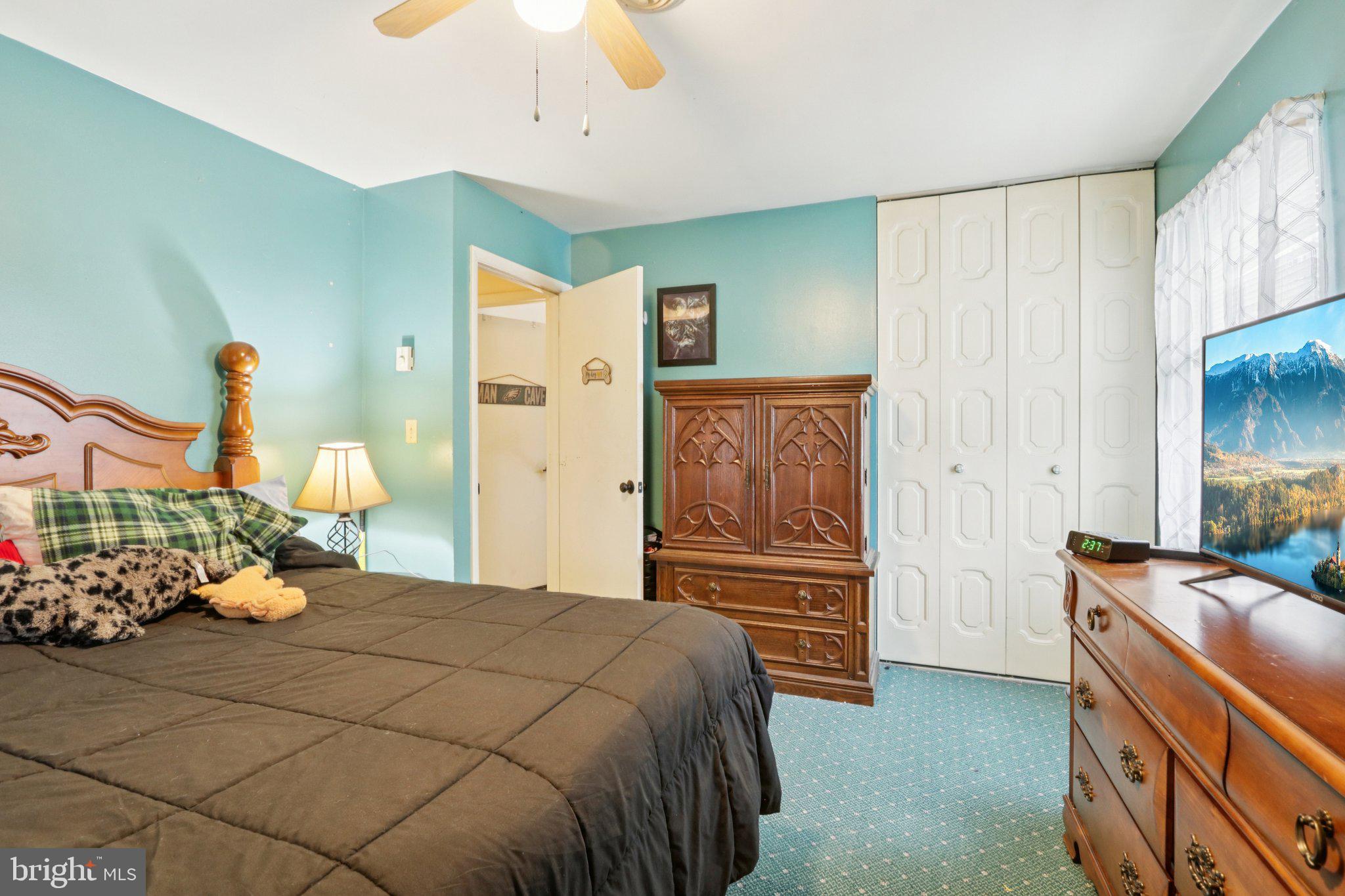 46 Gramercy Place Southampton, NJ 08088 - Photo 21 of 37 a bedroom with a bed and a dresser