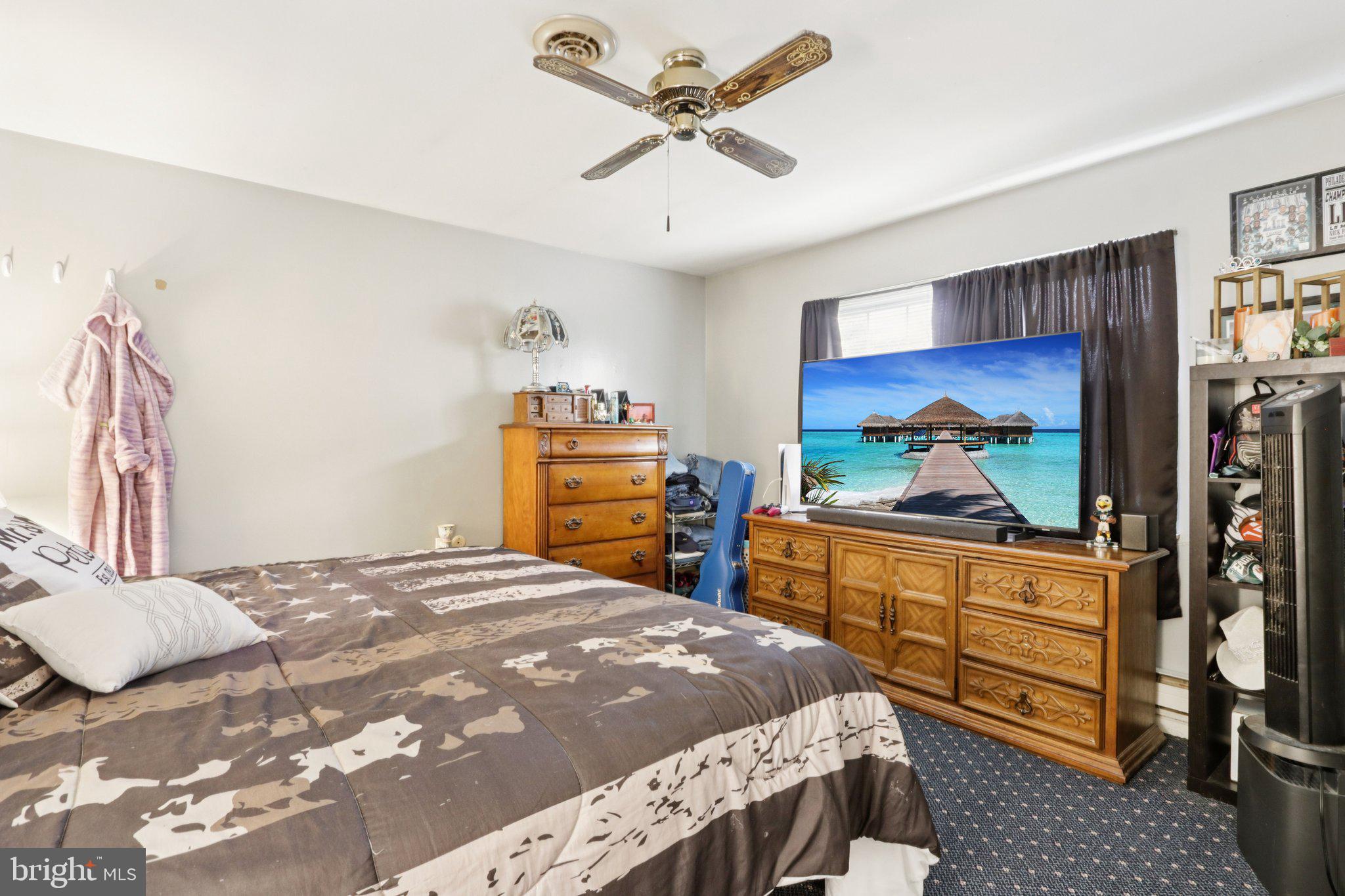 46 Gramercy Place Southampton, NJ 08088 - Photo 22 of 37 a bedroom with a bed and a dresser in it