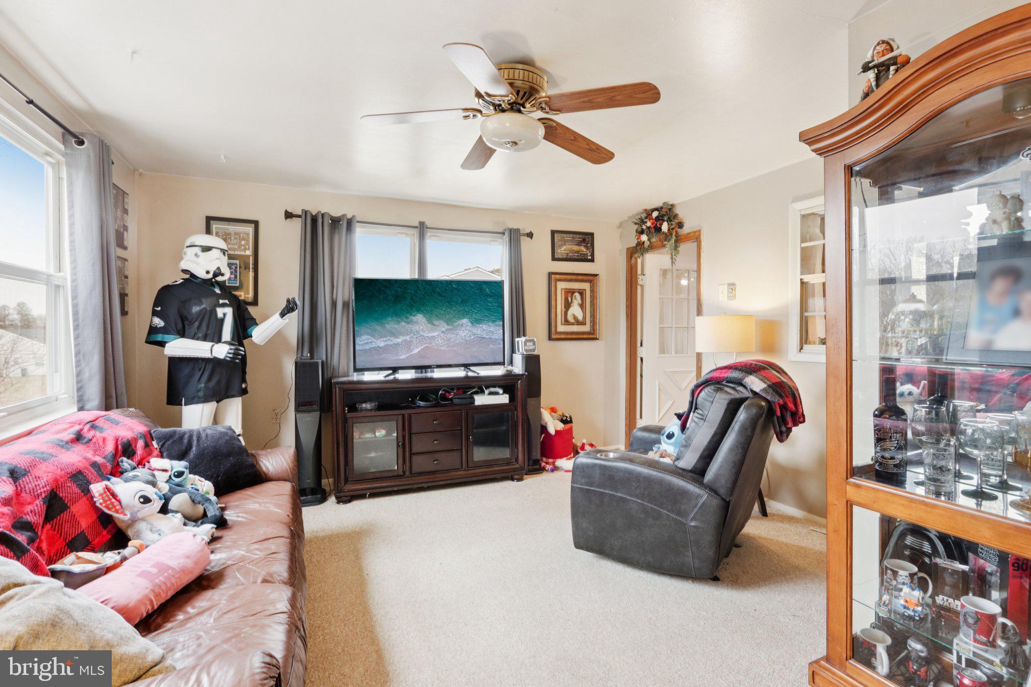 46 Gramercy Place Southampton, NJ 08088 - Photo 25 of 37 a living room with furniture and a flat screen tv
