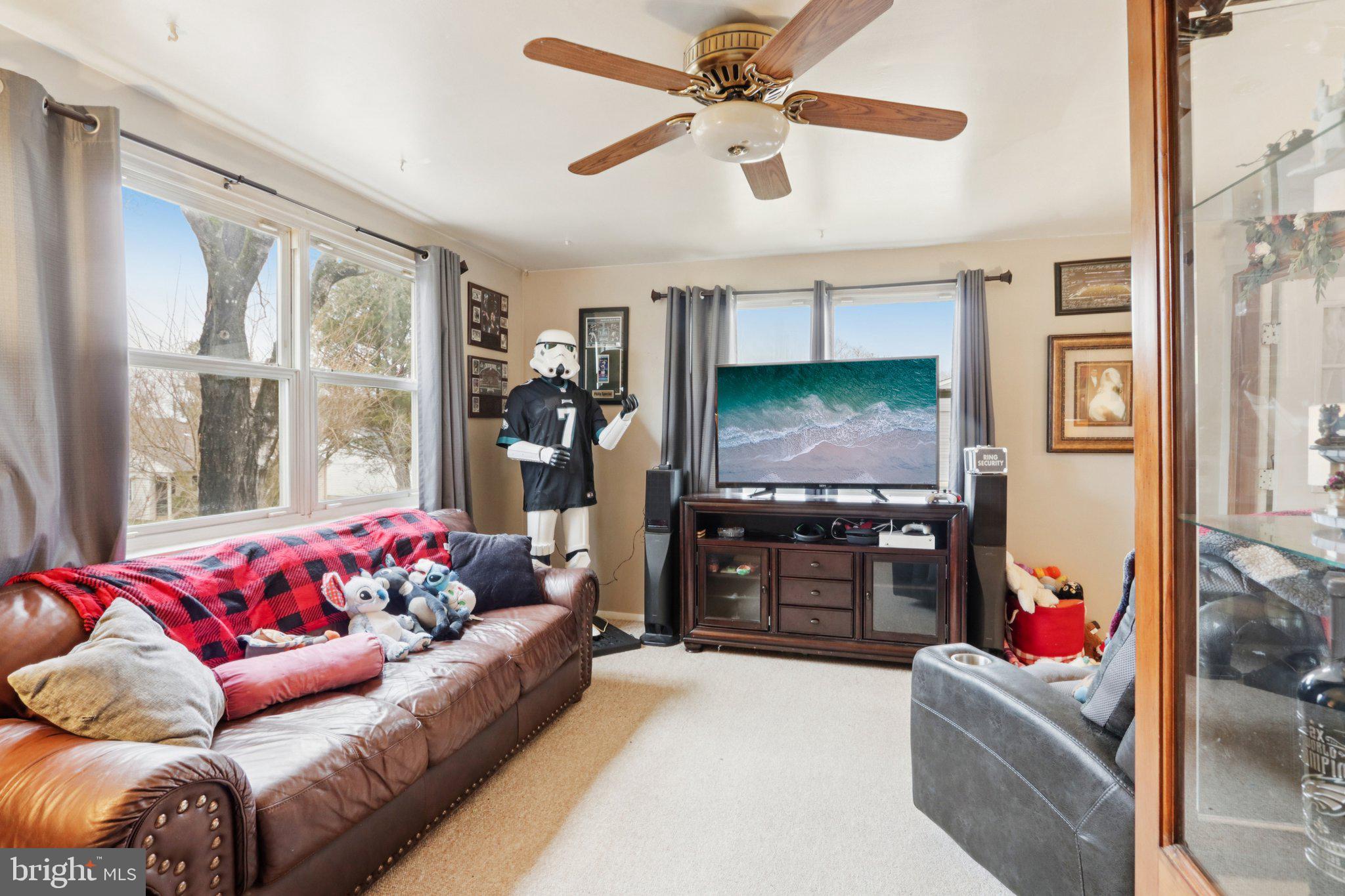 46 Gramercy Place Southampton, NJ 08088 - Photo 26 of 37 a living room with furniture and a flat screen tv