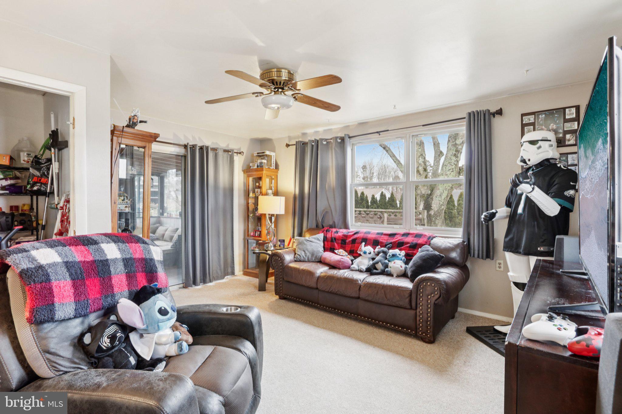 46 Gramercy Place Southampton, NJ 08088 - Photo 28 of 37 a living room with furniture and a large window