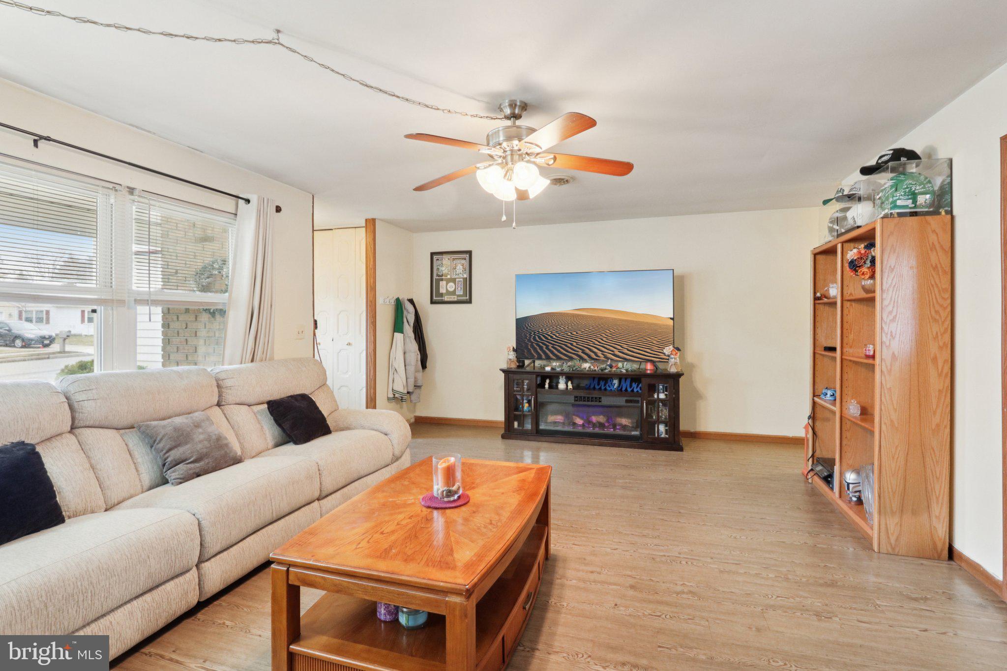46 Gramercy Place Southampton, NJ 08088 - Photo 10 of 37 a living room with furniture and a flat screen tv