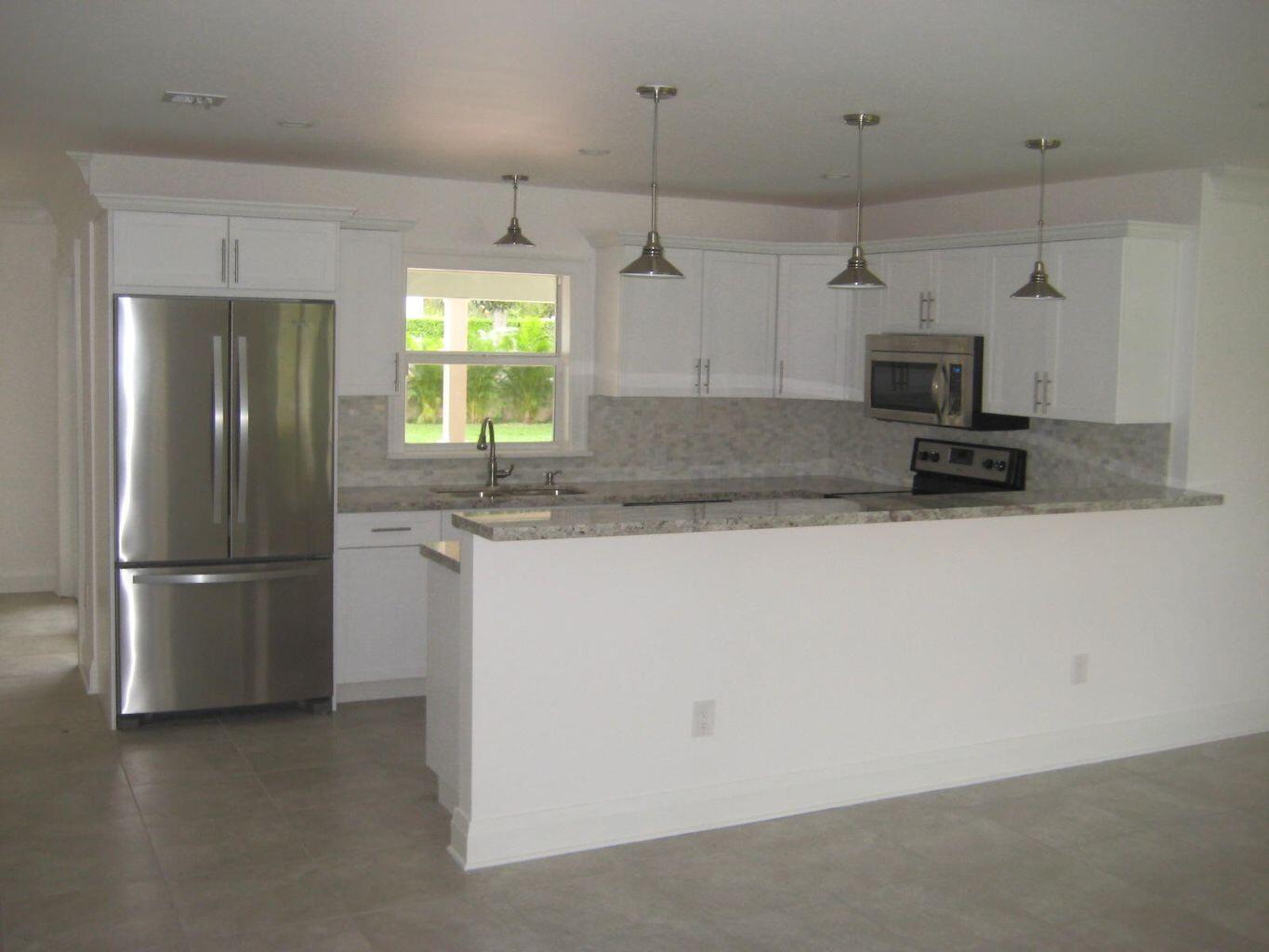 3244 Northwest 25th Way Boca Raton, FL 33434 - Photo 9 of 20 25thKitchen2