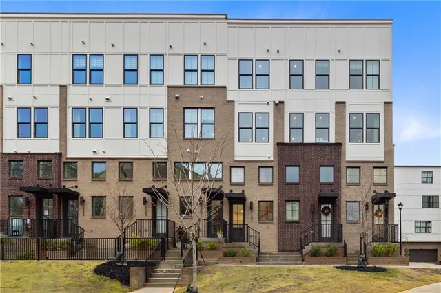 a front view of a building with street view