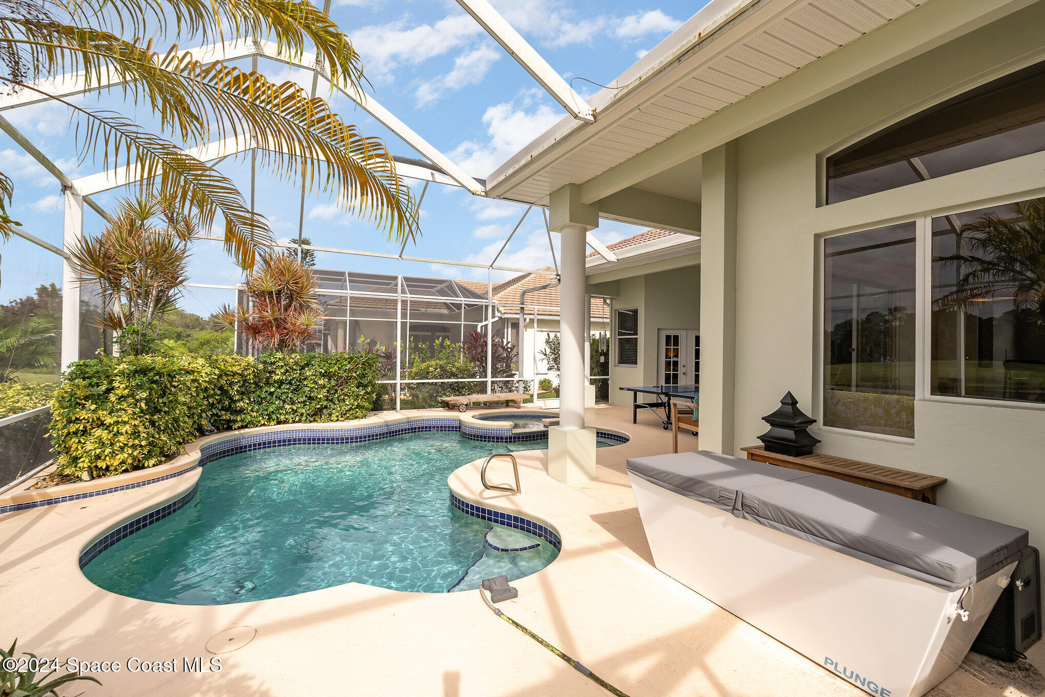 4321 Collingtree Drive Rockledge, FL 32955 - Photo 16 of 70 a view of a house with swimming pool and sitting area