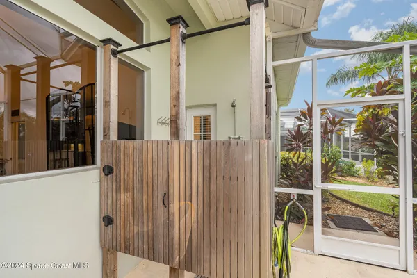 a spacious bathroom with a sink mirror and vanity