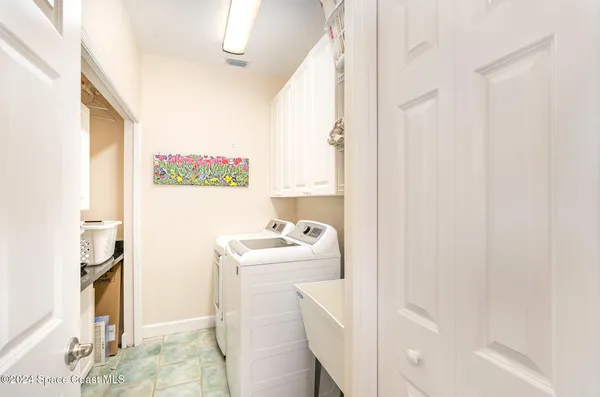 an aerial view of residential building and lake