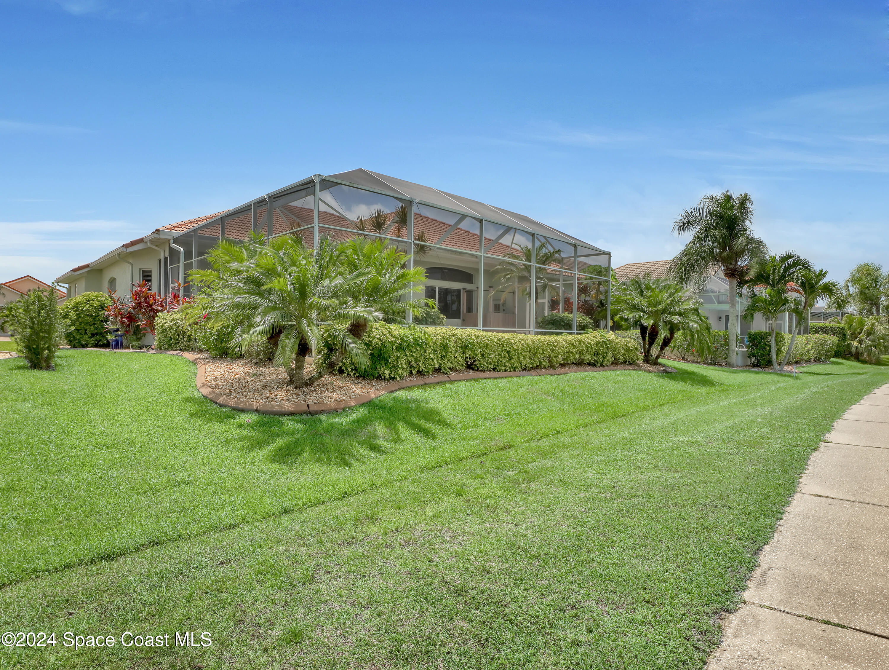 4321 Collingtree Drive Rockledge, FL 32955 - Photo 42 of 70 a front view of a house with garden