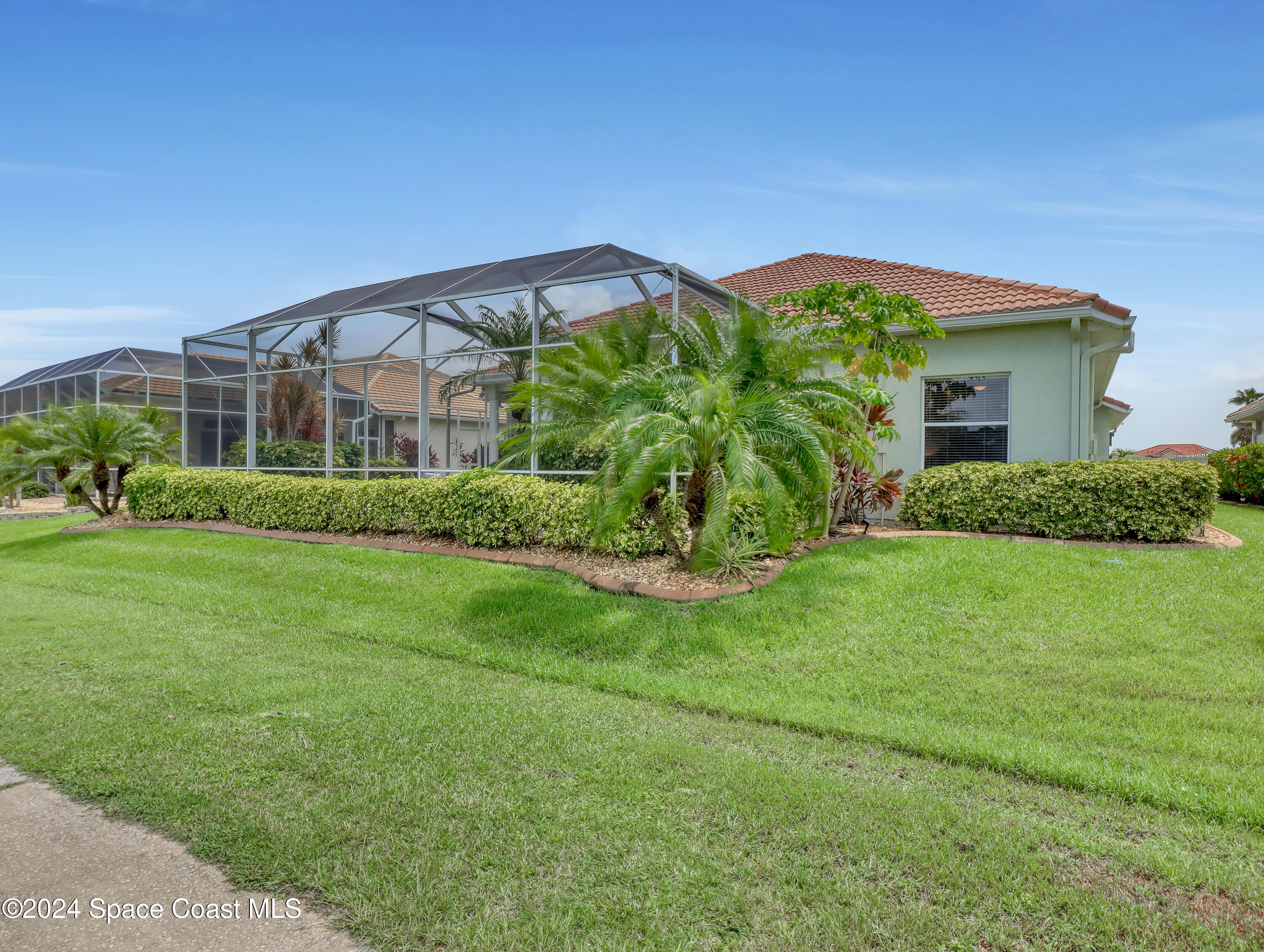 4321 Collingtree Drive Rockledge, FL 32955 - Photo 44 of 70 a view of a house with a garden
