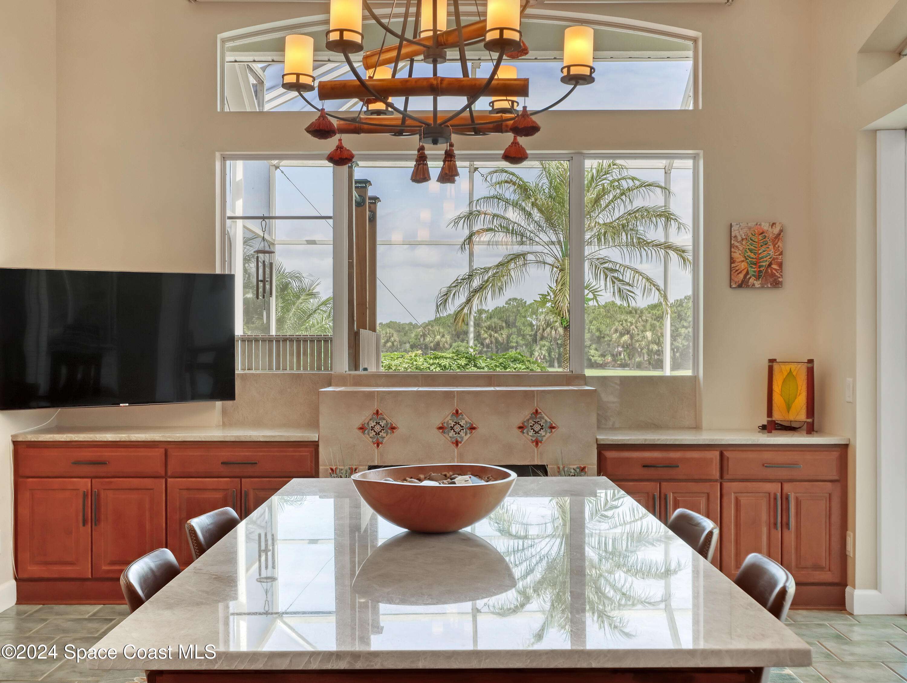 4321 Collingtree Drive Rockledge, FL 32955 - Photo 59 of 70 a kitchen with a stove a sink and a microwave