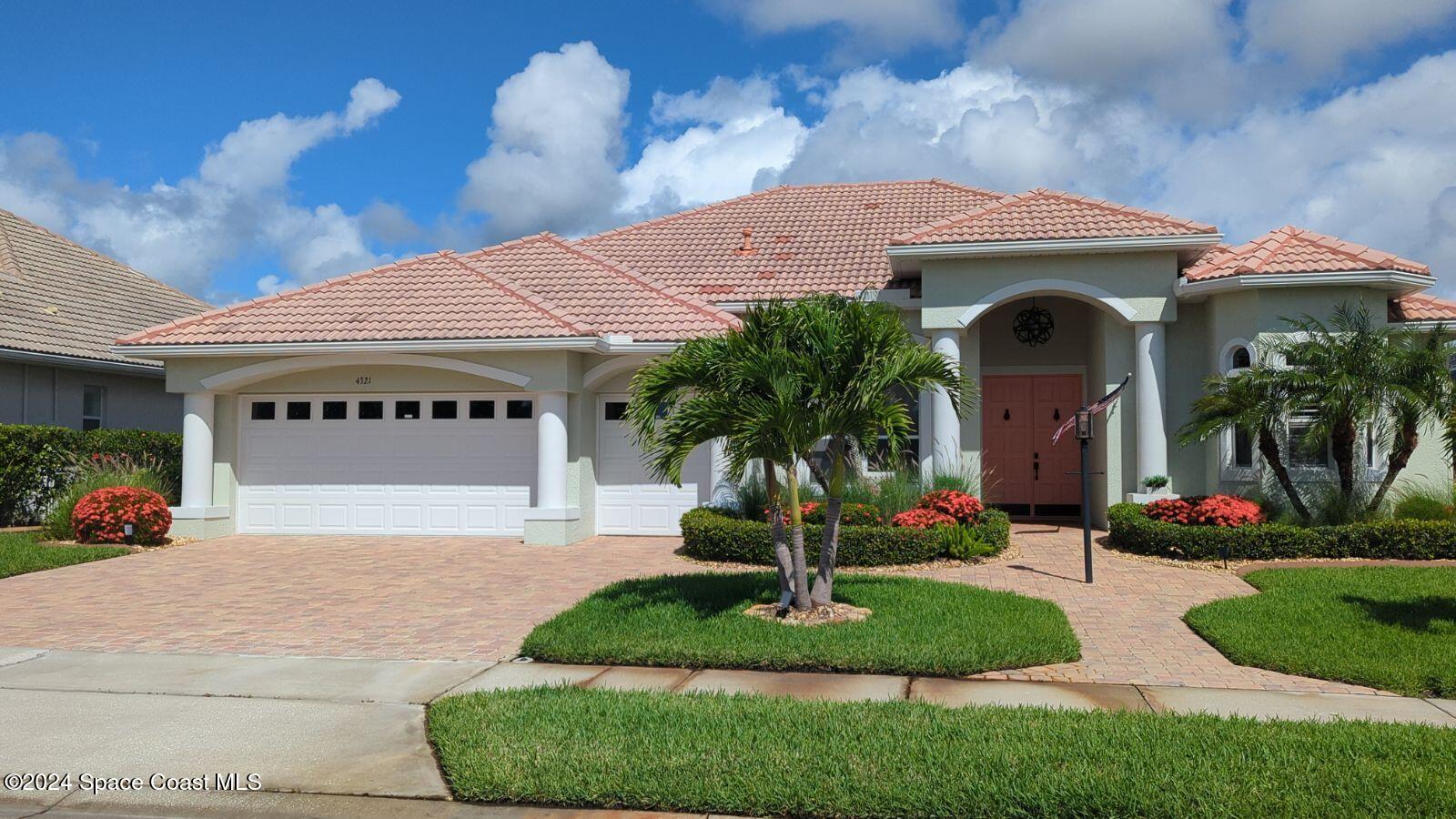 4321 Collingtree Drive Rockledge, FL 32955 - Photo 68 of 70 a front view of a house with garden