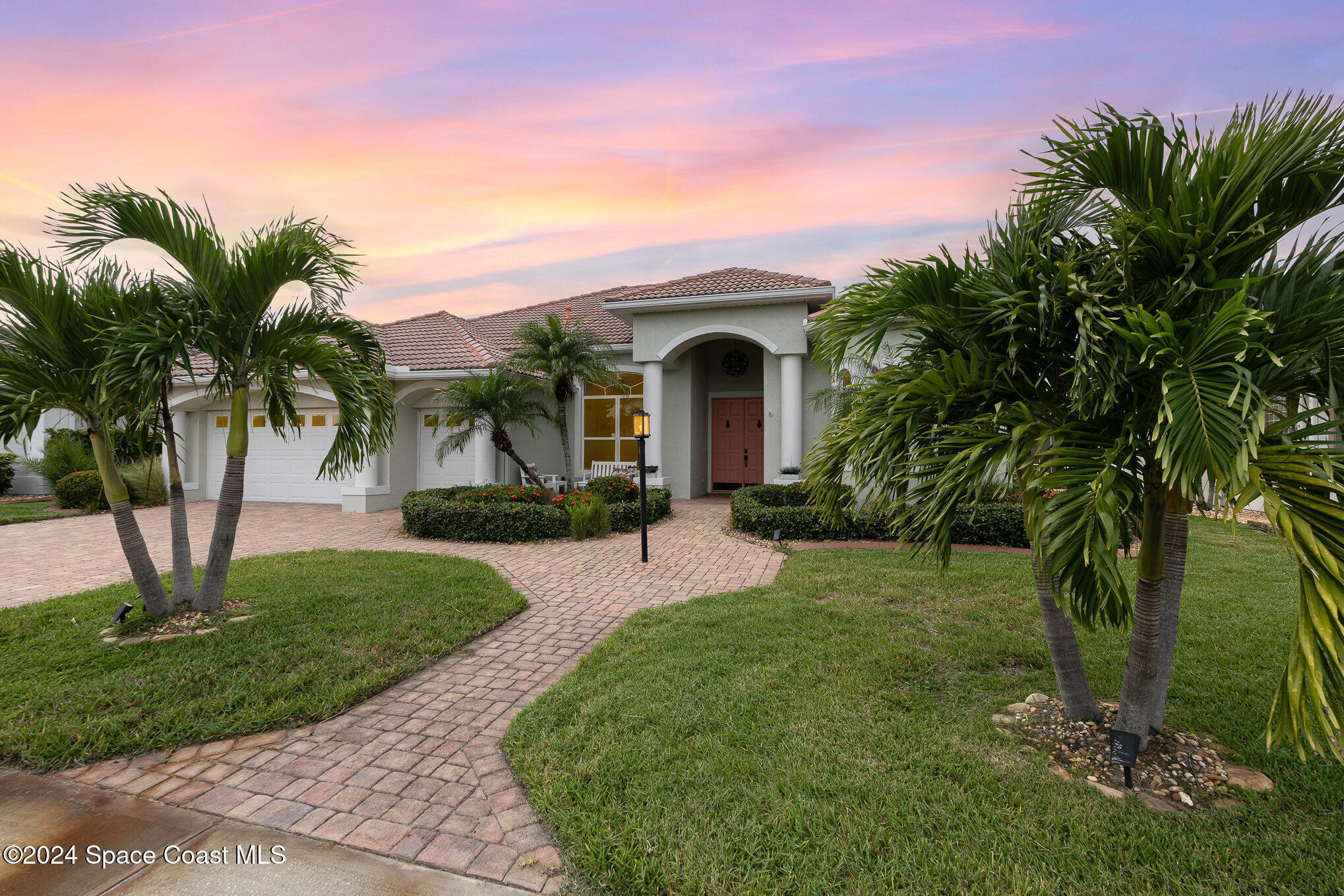 4321 Collingtree Drive Rockledge, FL 32955 - Photo 10 of 70 a front view of a house with garden