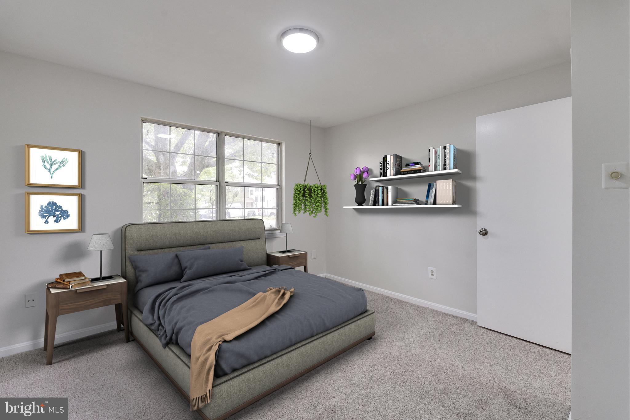 6 Normandy Square Court, Unit 2CB Silver Spring, MD 20906 - Photo 11 of 28 a bedroom with a bed and a window