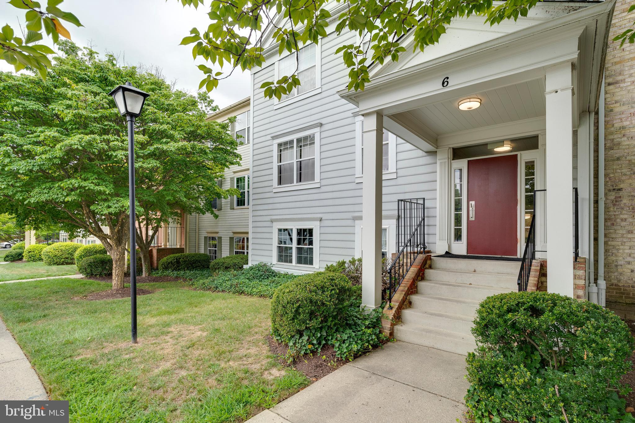 6 Normandy Square Court, Unit 2CB Silver Spring, MD 20906 - Photo 2 of 28 a view of a house with a yard