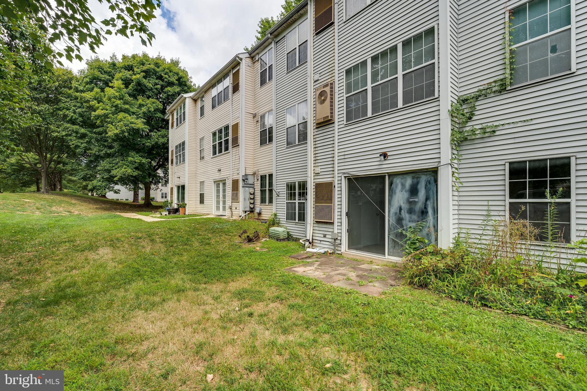 6 Normandy Square Court, Unit 2CB Silver Spring, MD 20906 - Photo 22 of 28 a view of a house with backyard and garden