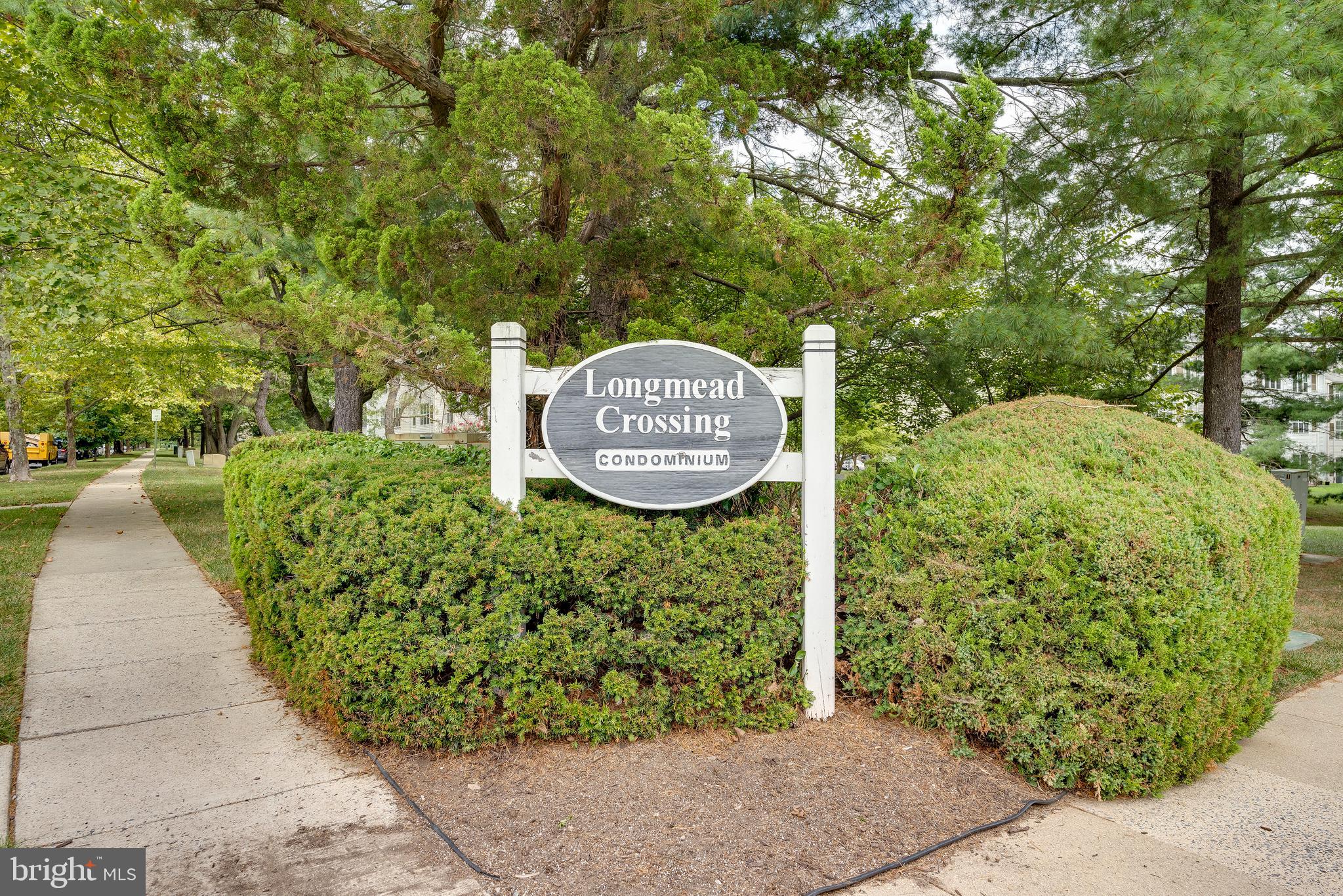 6 Normandy Square Court, Unit 2CB Silver Spring, MD 20906 - Photo 23 of 28 a view of a sign board with a park