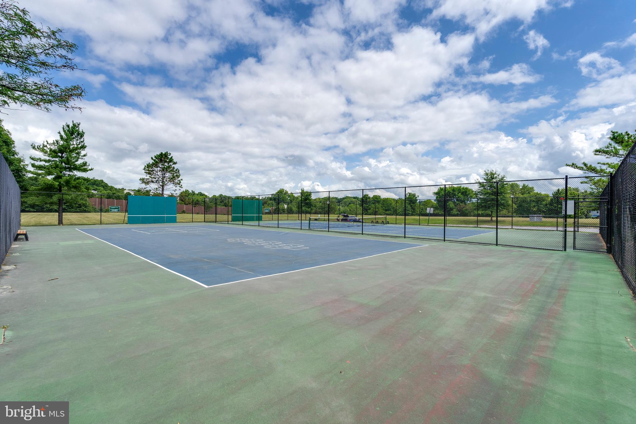 6 Normandy Square Court, Unit 2CB Silver Spring, MD 20906 - Photo 26 of 28 a view of a tennis court