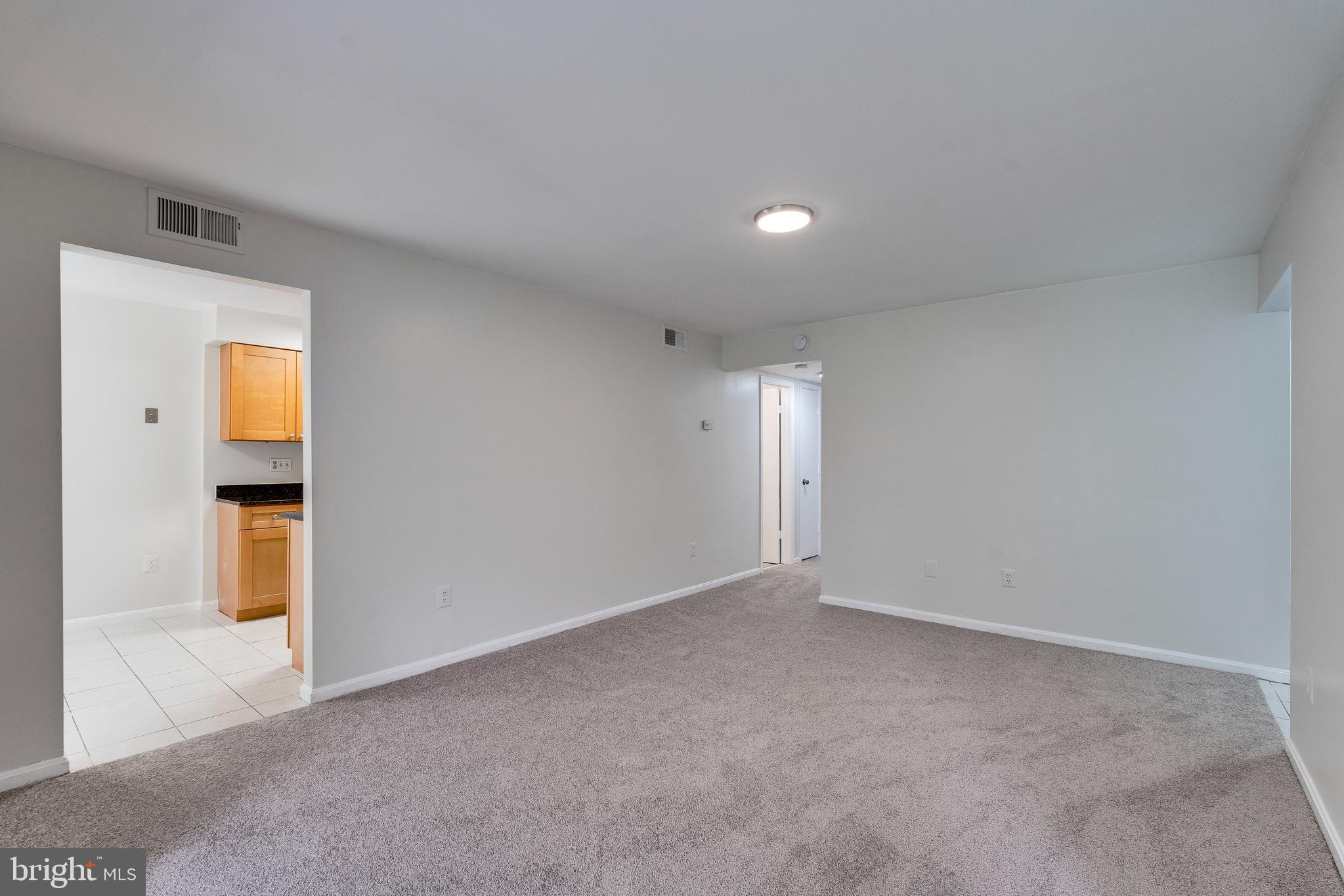 6 Normandy Square Court, Unit 2CB Silver Spring, MD 20906 - Photo 5 of 28 a view of an empty room