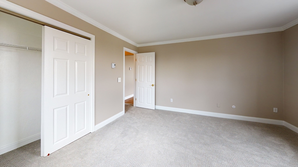 326 Broadway, Unit 21 Somerville, MA 02145 - Photo 5 of 8 a view of an empty room