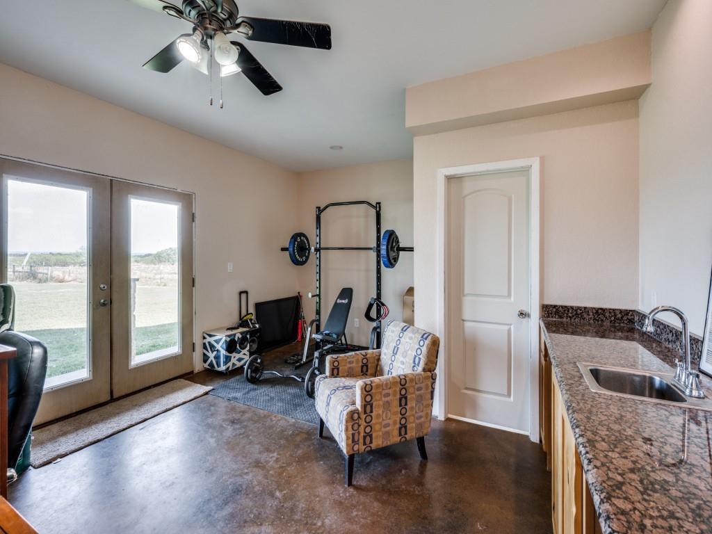 2250 Morrow Road Valley View, TX 76272 - Photo 25 of 35 a living room with furniture and a large window