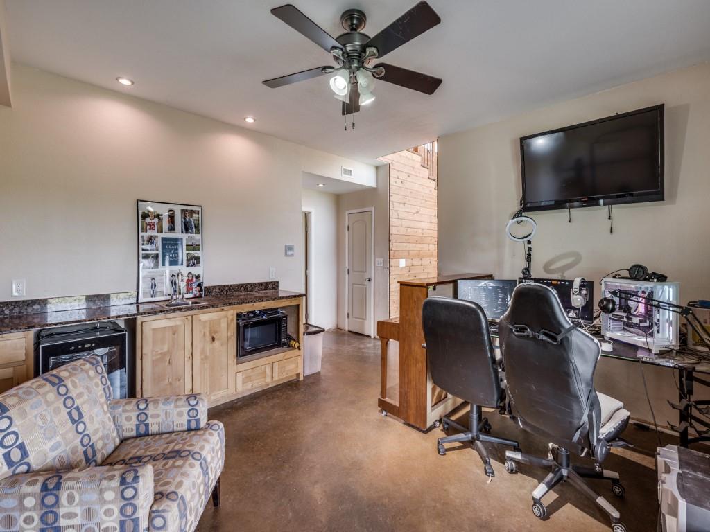2250 Morrow Road Valley View, TX 76272 - Photo 26 of 35 a living room with furniture and a flat screen tv