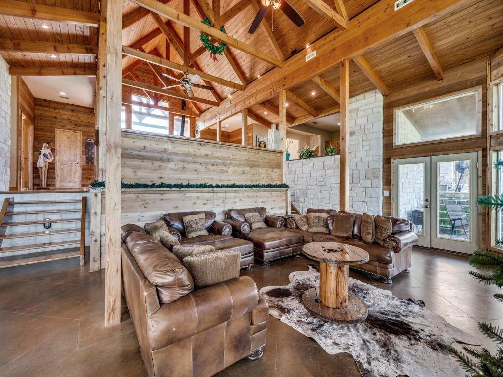 2250 Morrow Road Valley View, TX 76272 - Photo 7 of 35 a outdoor space with patio the couches and a dining table with the view of the balcony