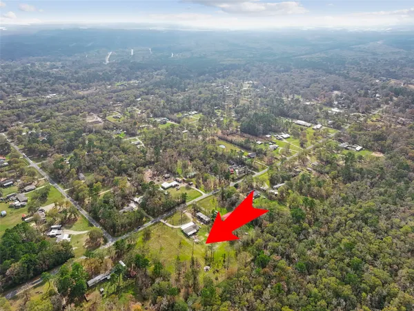 a view of lake with green space