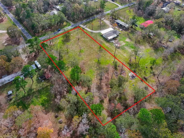 a view of a yard with an outdoor space