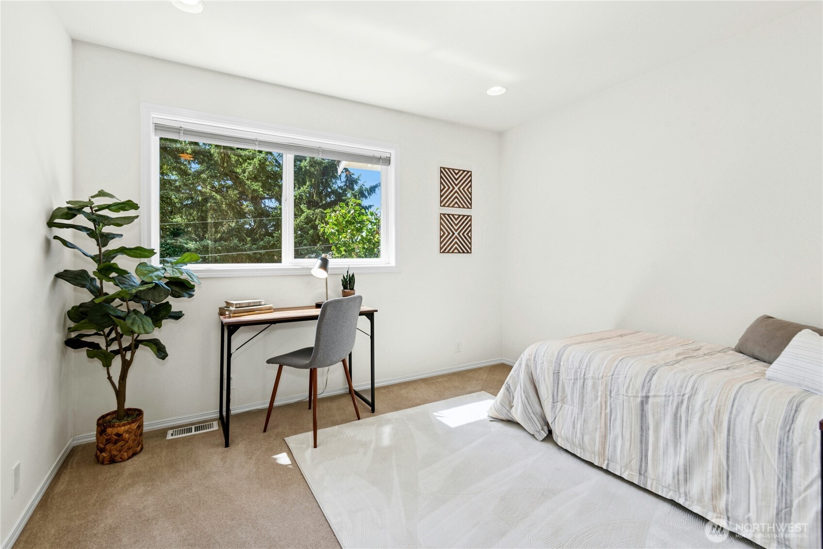 23621 7th Avenue West Bothell, WA 98021 - Photo 17 of 33 a bedroom with a bed and a potted plant