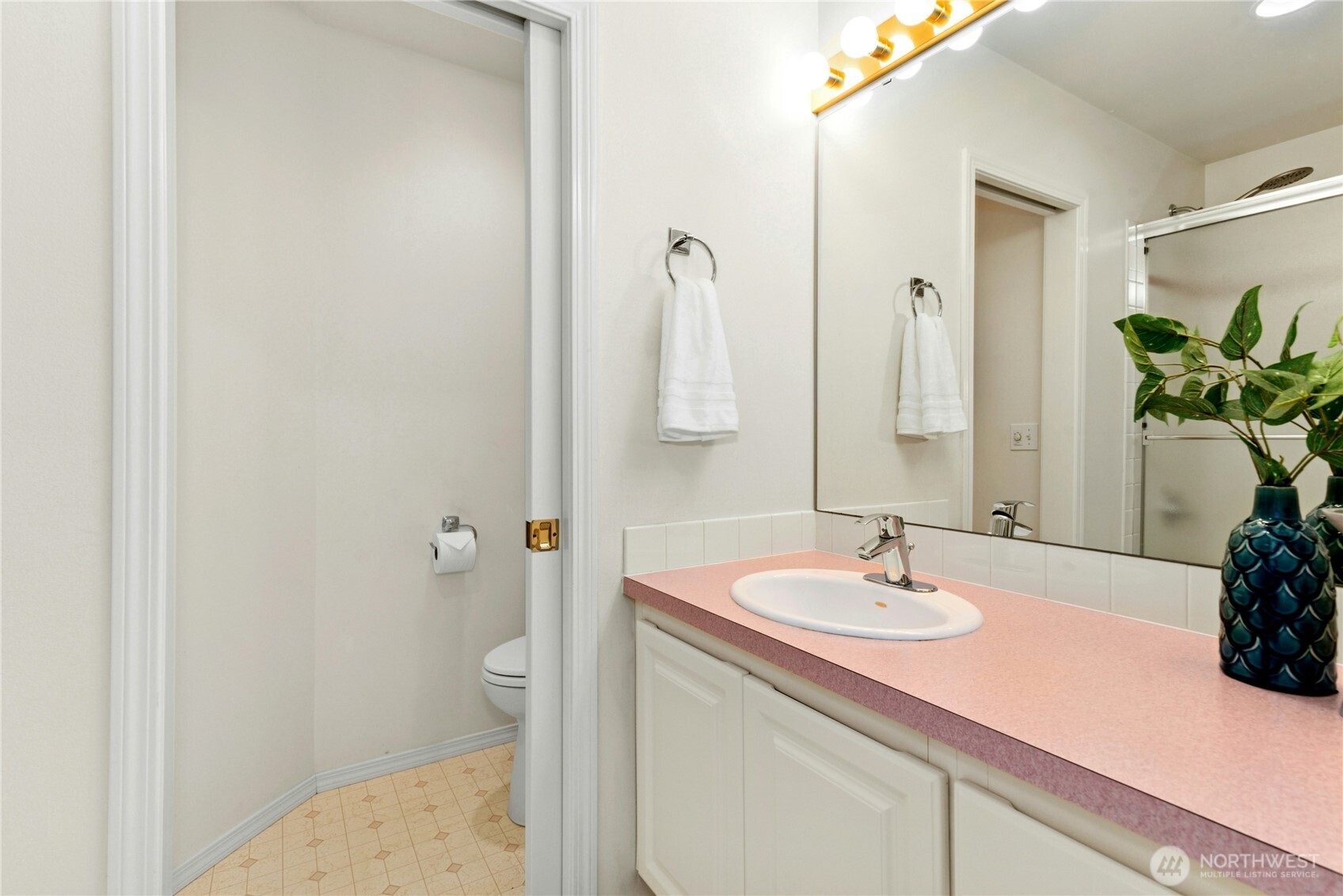 23621 7th Avenue West Bothell, WA 98021 - Photo 18 of 33 a bathroom with a sink and a mirror