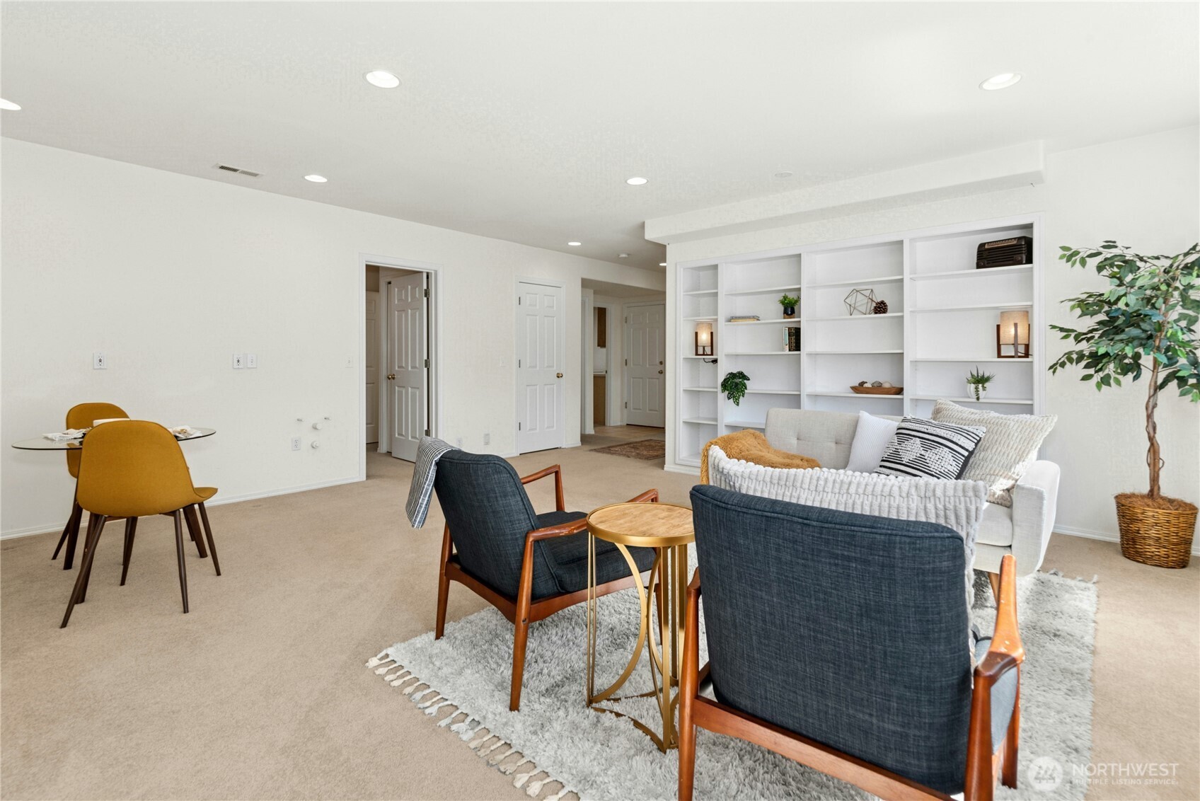 23621 7th Avenue West Bothell, WA 98021 - Photo 20 of 33 a living room with furniture and a chair
