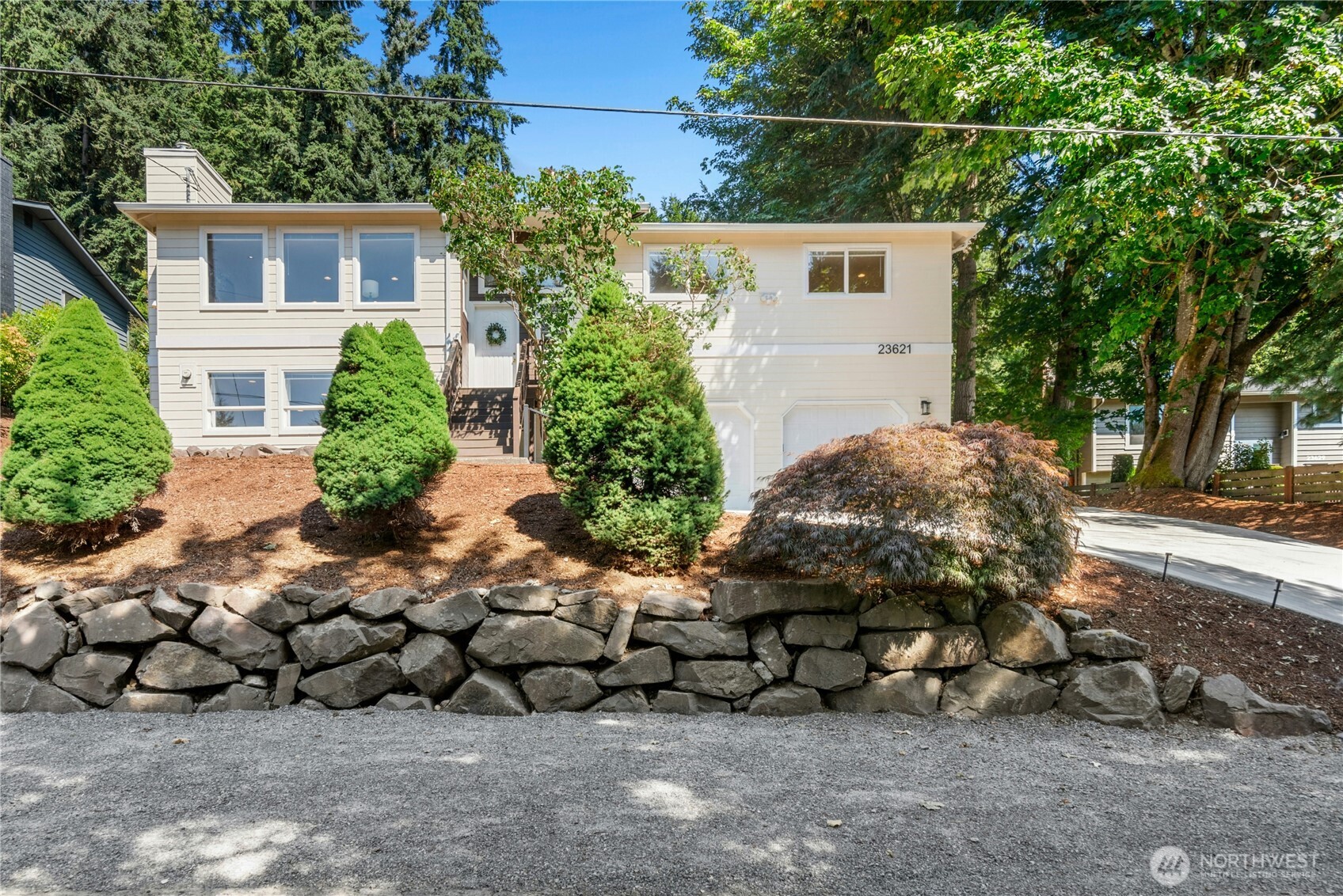 23621 7th Avenue West Bothell, WA 98021 - Photo 2 of 33 a view of a house with a yard and a garden