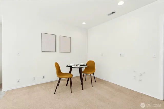 a view of a room with table and chair