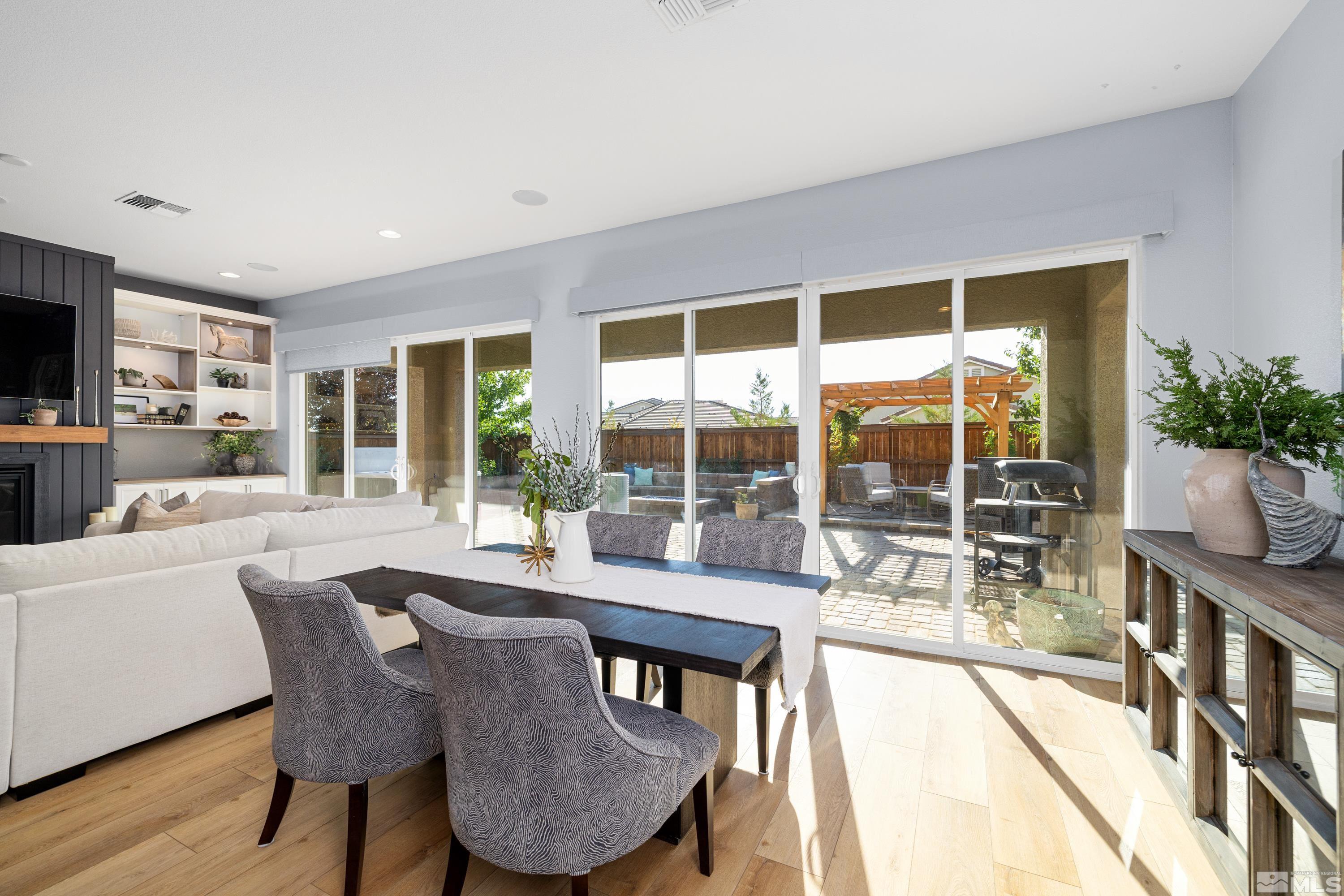 3320 Show Jumper Lane Reno, NV 89521 - Photo 8 of 38 a dining room with furniture window and outside view