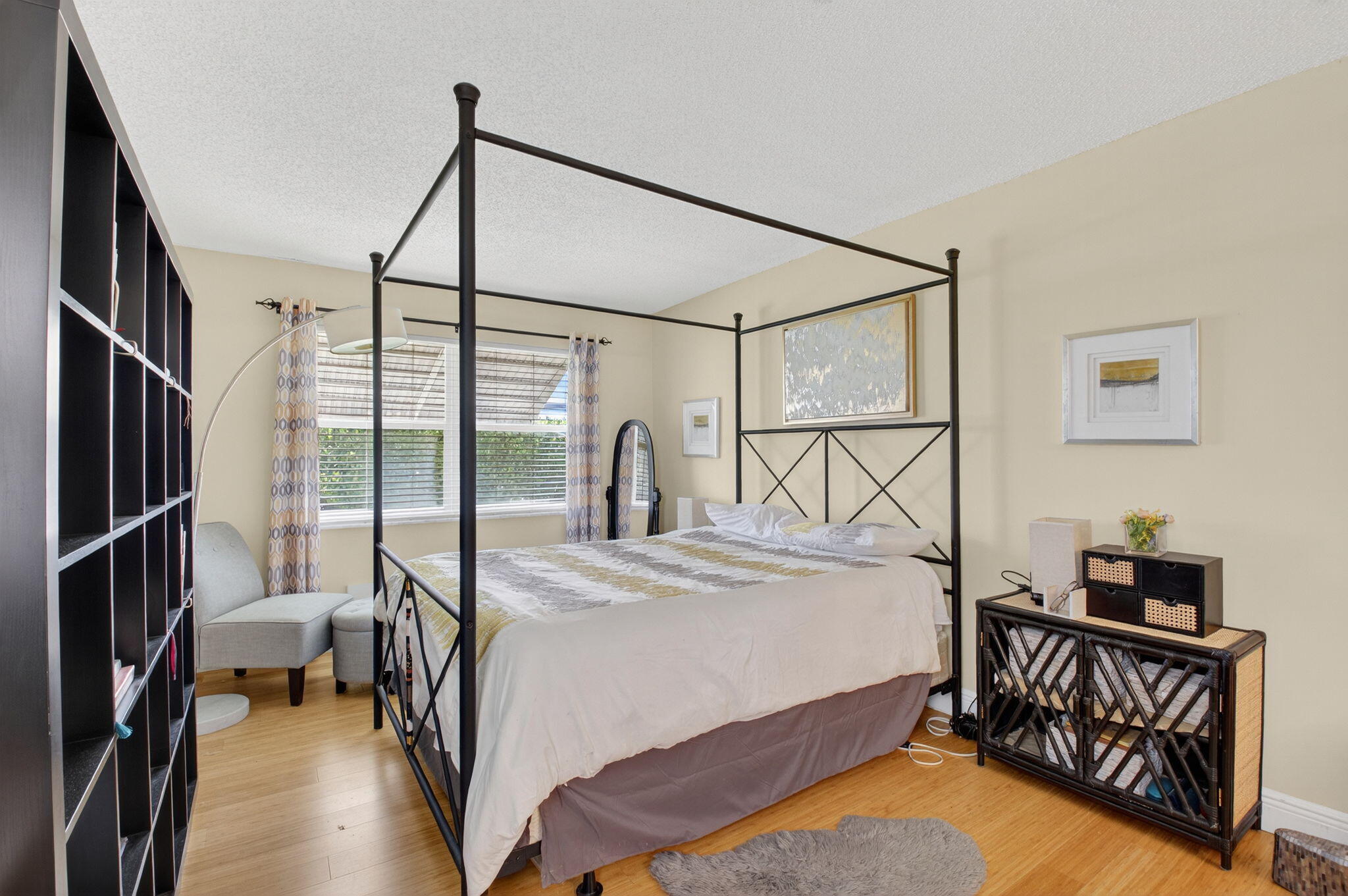 762 High Point Boulevard North, Unit D Delray Beach, FL 33445 - Photo 22 of 32 a bedroom with a bed window and a table