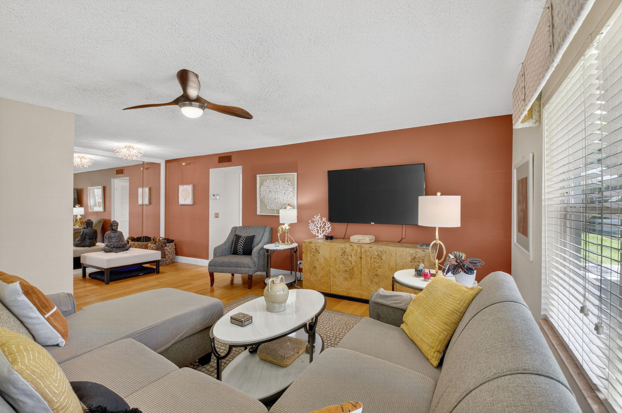 762 High Point Boulevard North, Unit D Delray Beach, FL 33445 - Photo 9 of 32 a living room with furniture and a flat screen tv