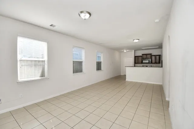 an empty room with windows