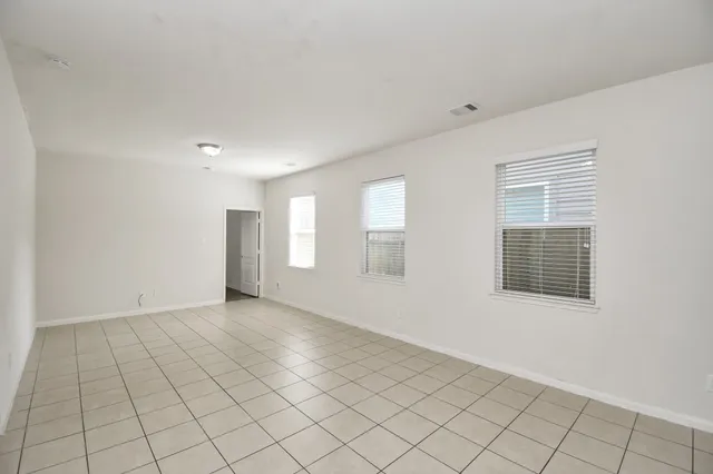 a view of an empty room with window