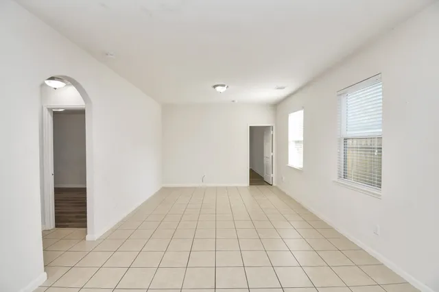 a view of an empty room and window