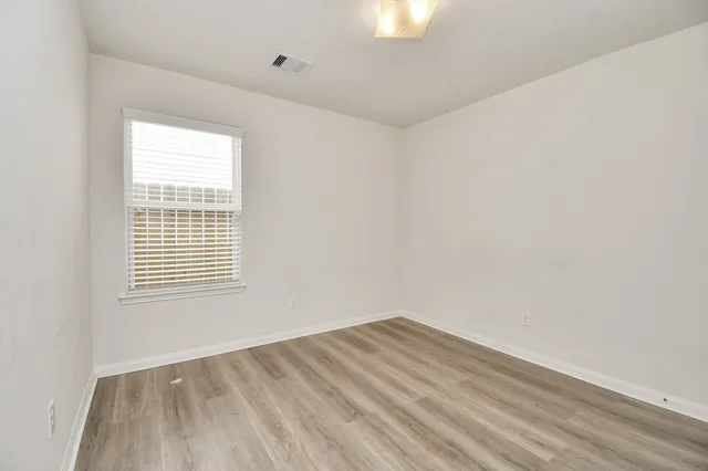 an empty room with a window