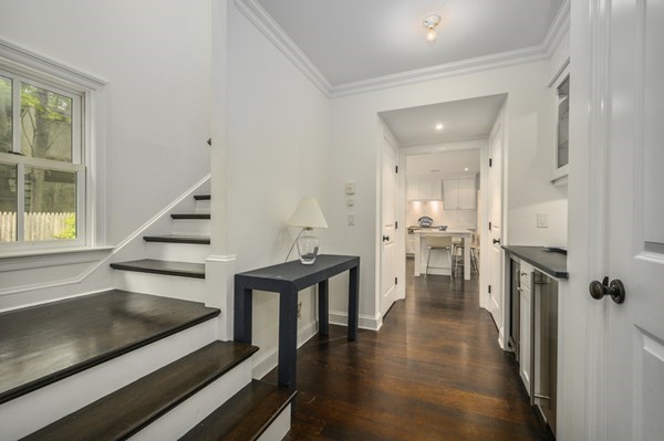 50 Nickerson Drive Barnstable, MA 02635 - Photo 14 of 36 a view of a hallway with wooden floor and staircase