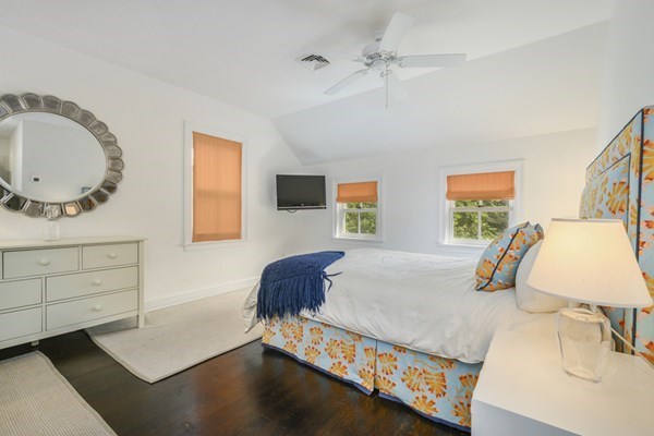 50 Nickerson Drive Barnstable, MA 02635 - Photo 18 of 36 a bedroom with a bed a mirror and window