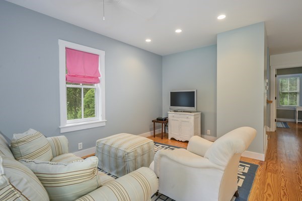 50 Nickerson Drive Barnstable, MA 02635 - Photo 25 of 36 a living room with furniture a window and a flat screen tv