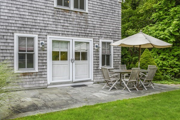 50 Nickerson Drive Barnstable, MA 02635 - Photo 32 of 36 a view of a house with backyard and sitting area