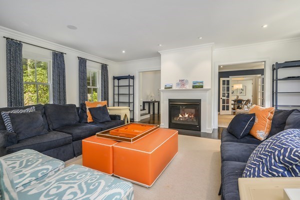 50 Nickerson Drive Barnstable, MA 02635 - Photo 9 of 36 a living room with furniture and a fireplace