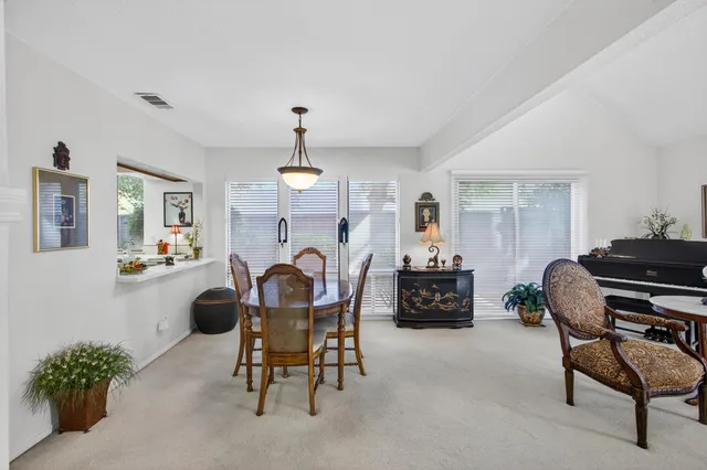 a kitchen that has a sink and a stove