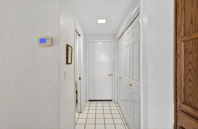 a view of a livingroom with furniture and windows