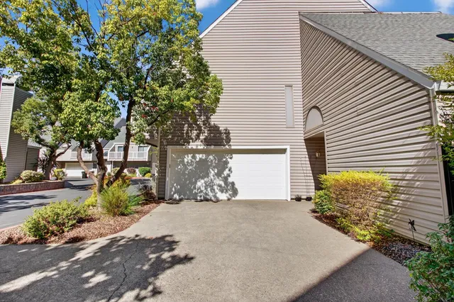 a front view of a house with outdoor space