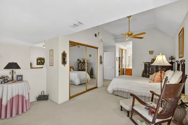 a swimming pool with outdoor seating and yard