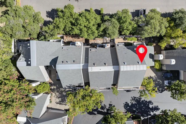 an aerial view of a city with lots of residential buildings